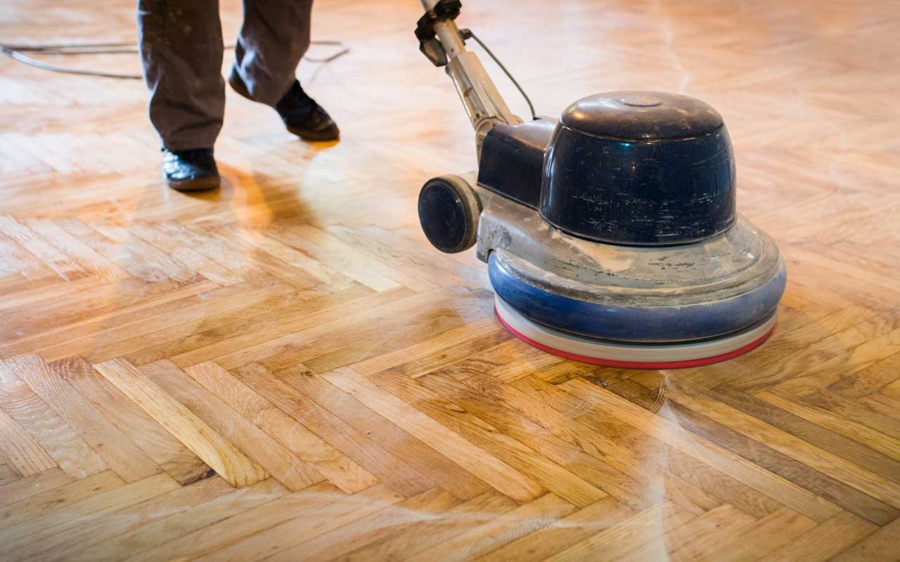 technician polishing marble floor